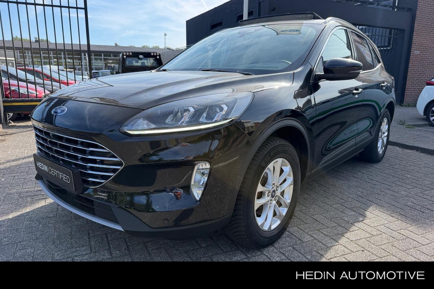 Ford Kuga - 2.5 PHEV Titanium | Panoramadak | Driver Assistance Pack | Winter Pack - AutoWereld.nl