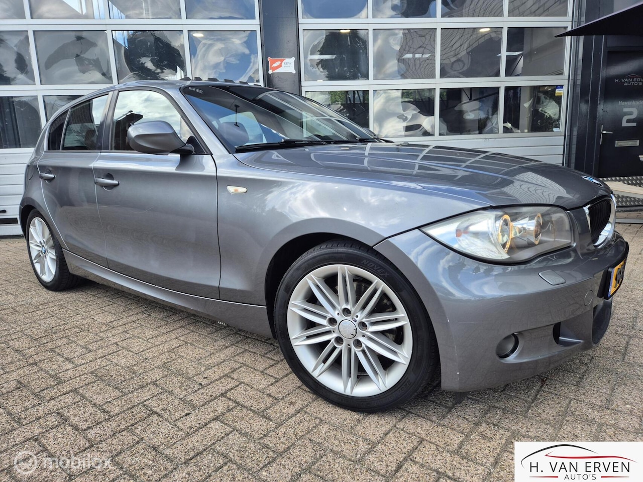 BMW 1-serie - 120i SCHUIFKANTELDAK XENON PDC 17" SPORTSTOELEN - AutoWereld.nl