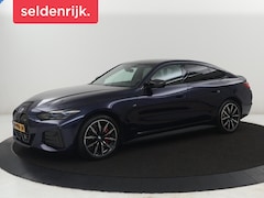 BMW i4 - M50 High Executive 84 kWh | SOH 94, 4% | Leder | Adaptive cruise | xDrive | Stoelverwarmin