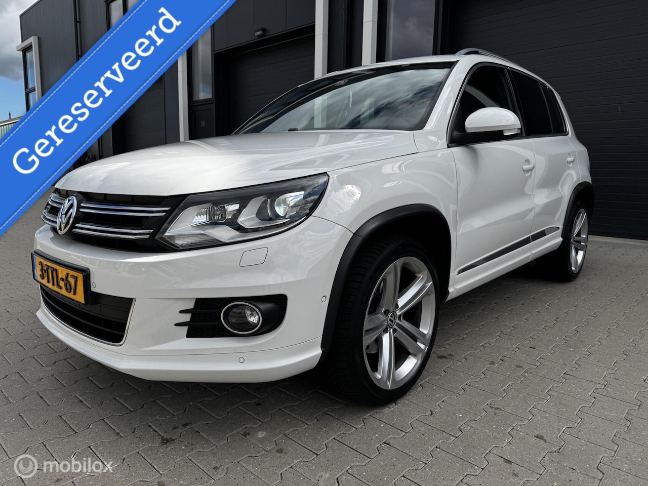 Volkswagen Tiguan - 2.0 TDI Sport&Style 4Motion R-LINE 2014 - AutoWereld.nl