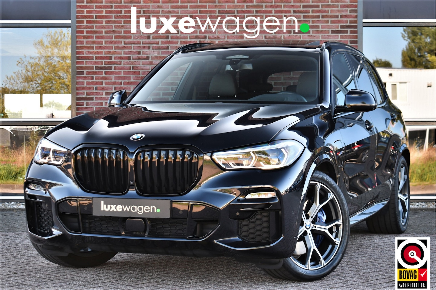 BMW X5 - xDrive45e 394pk M-Sport Pano ACC Trekh 360 HUD Comf-zetel H/K - AutoWereld.nl