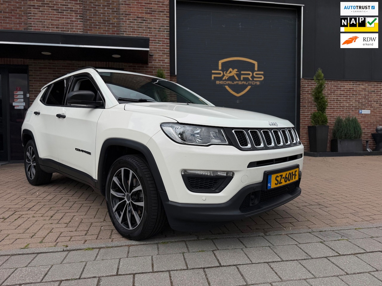Jeep Compass - 1.4 MultiAir Sport 140PK Airco Cruise Camera Navi Appel Carplay Trekhaak zeer nette - AutoWereld.nl
