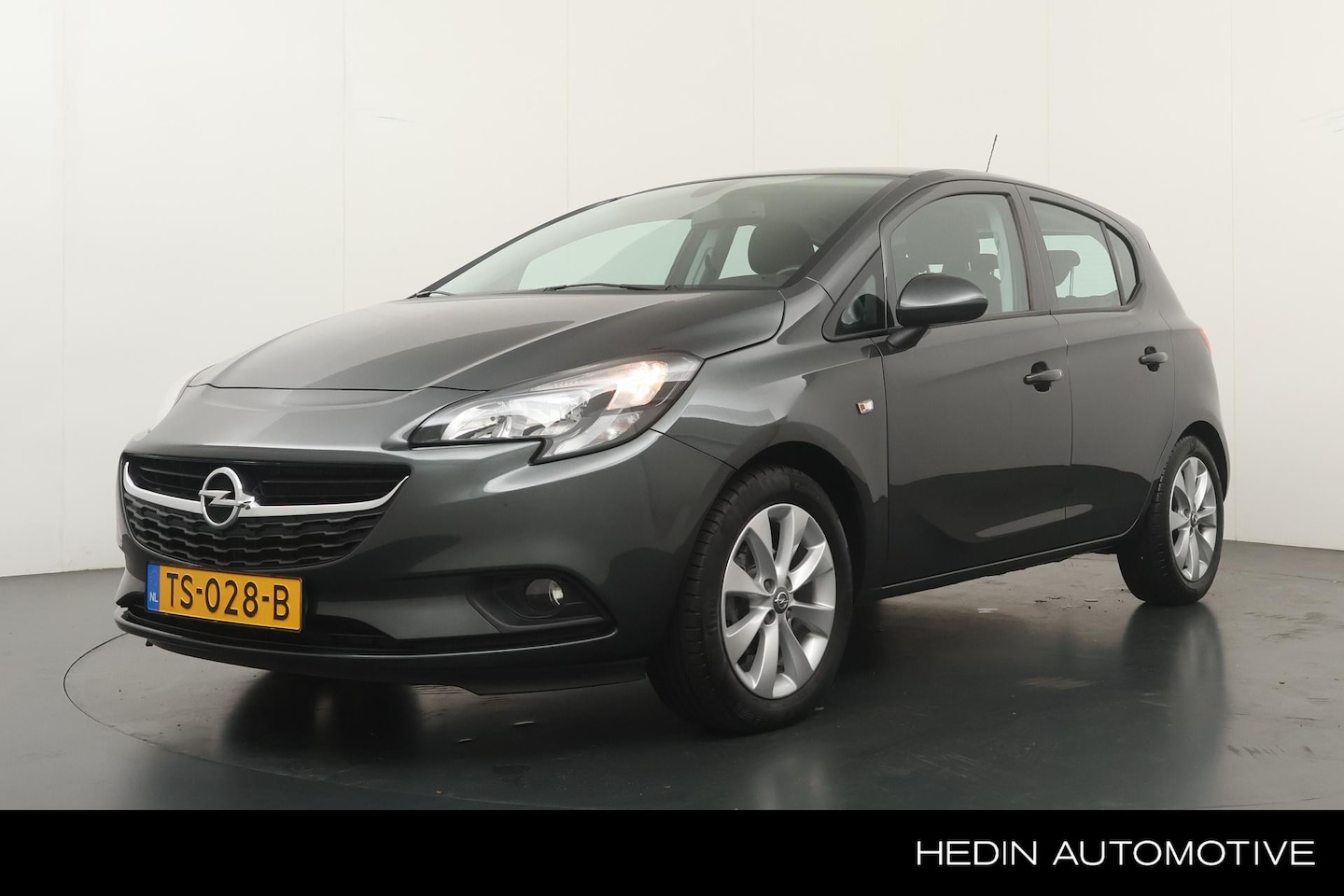Opel Corsa - 1.4 Favourite | Airco | Navigatie | Trekhaak | 16"LM Velgen | Cruise Control | - AutoWereld.nl