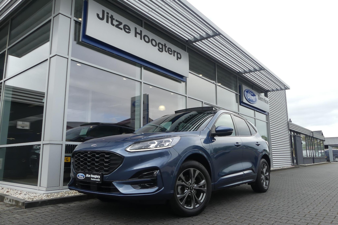 Ford Kuga - 2.5 PHEV ST-Line X ELEKT. TREKHAAK (1.500KG), PANO, WINTER PACK, ADAPT. CRUISE, CLIMA, NAV - AutoWereld.nl