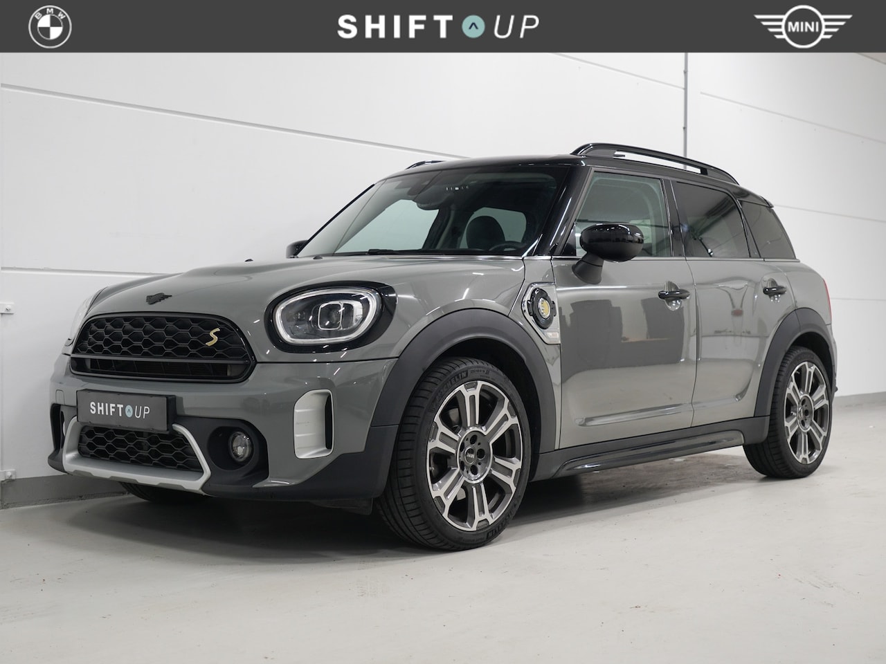 MINI Countryman - 1.5 Cooper S E ALL4 Panoramadak | Head Up | Stoelverwarming - AutoWereld.nl
