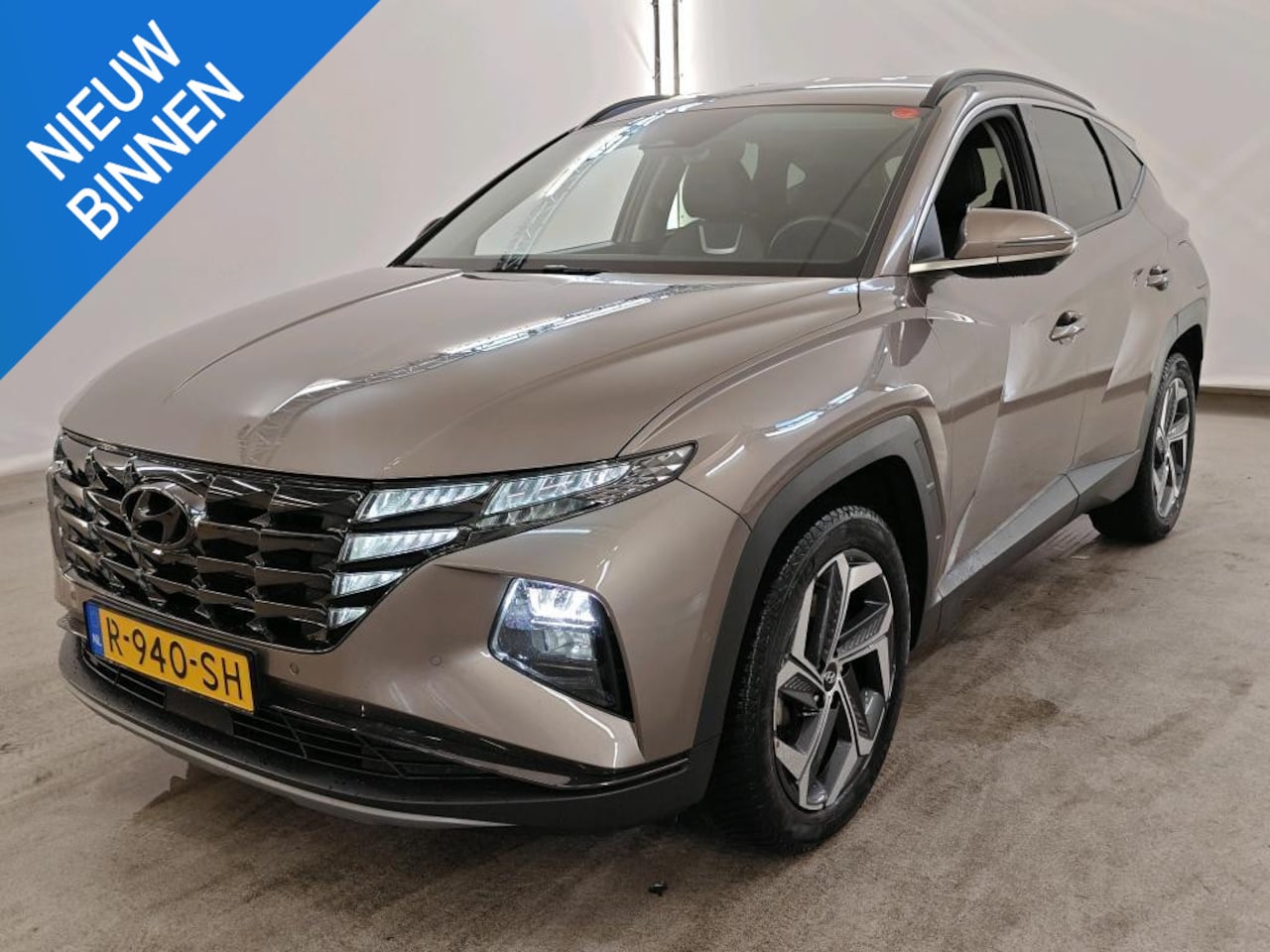 Hyundai Tucson - 1.6 T-GDI HEV PREMIUM I AUTOMAAT I 360 CAMERA I APPLE CARPLAY I CLIMATE CONTROL - AutoWereld.nl