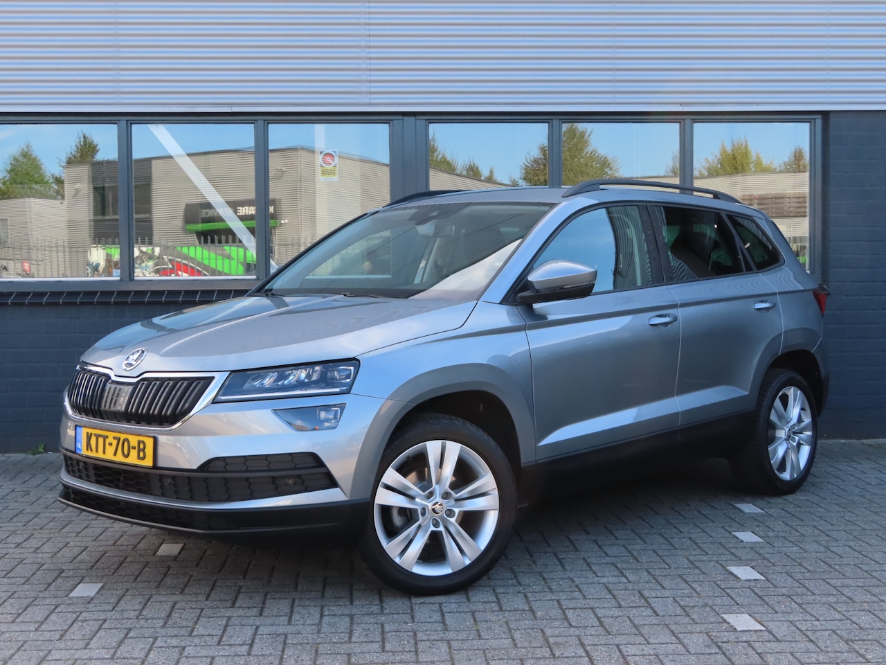 Skoda Karoq - 1.0 TSI Style DSG | Elektrische verstelbare stoel met geheugen | stoelverwarming | camera - AutoWereld.nl