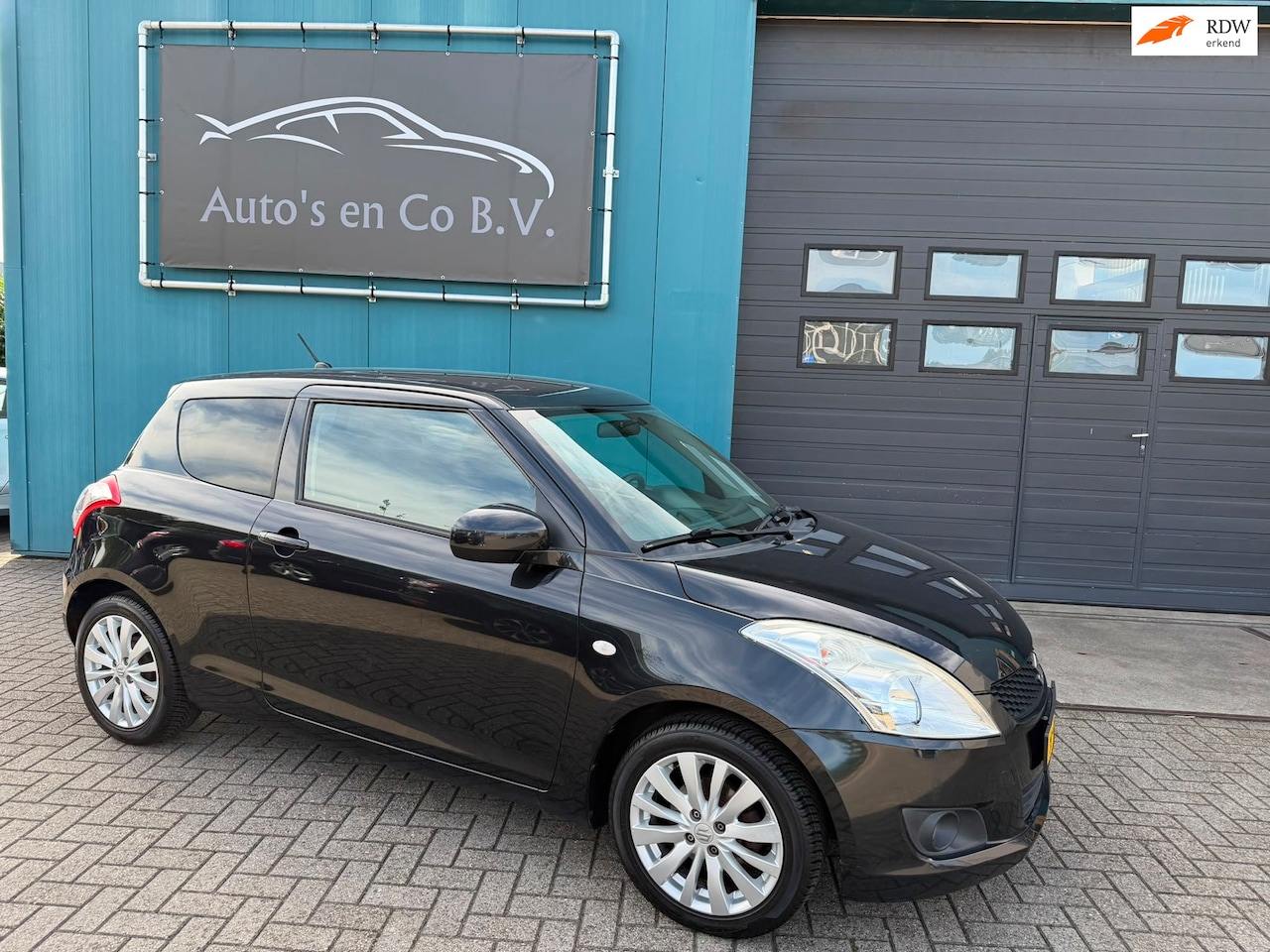 Suzuki Swift - 1.2 Exclusive EASSS 2012 Airco Facelift model 16" Lm velgen - AutoWereld.nl