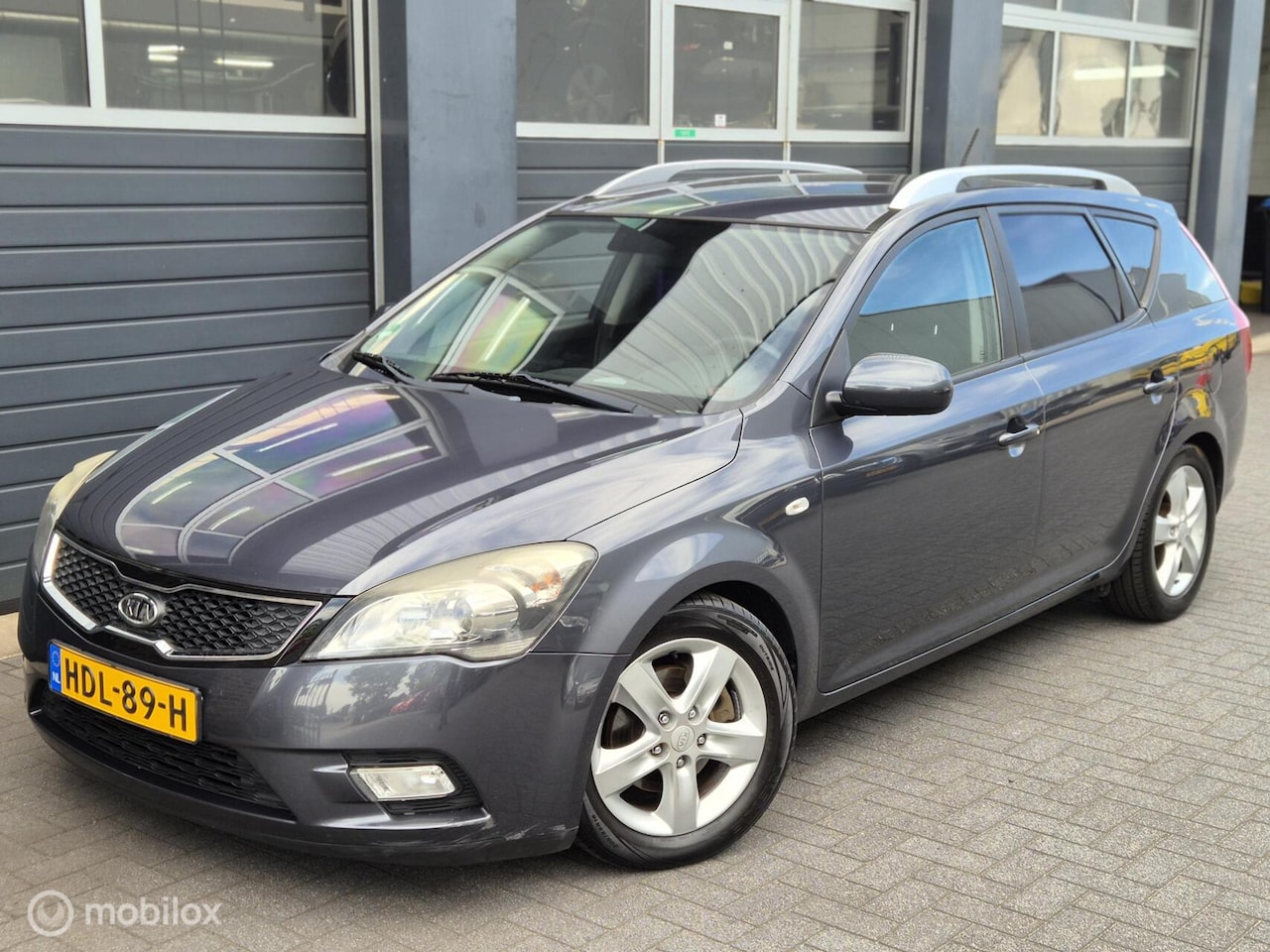 Kia Cee'd Sporty Wagon - 1.4 CVVT X-executive | CAMERA | PDC | STOEL.V | - AutoWereld.nl