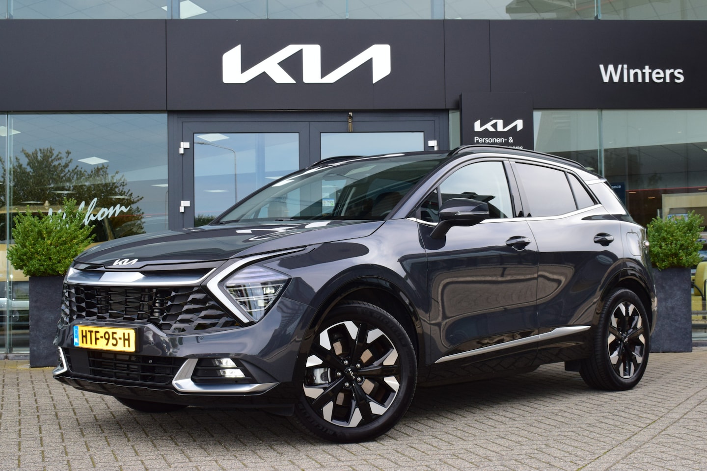 Kia Sportage - 1.6 T-GDi Plug-in Hybrid AWD DynamicPlusLine | Schuif-/ Kanteldak | Dodehoekassistentie | - AutoWereld.nl