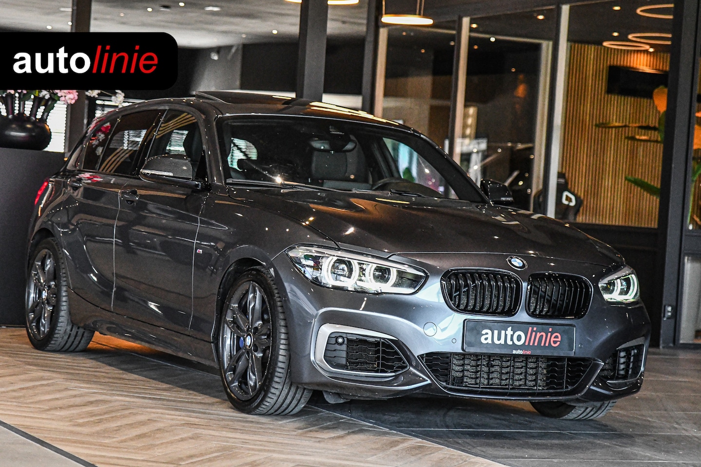 BMW 1-serie - M140i High Executive M140i High Executive, LCI2, Pano, Carbon, H.Kardon, Camera, Leder! - AutoWereld.nl