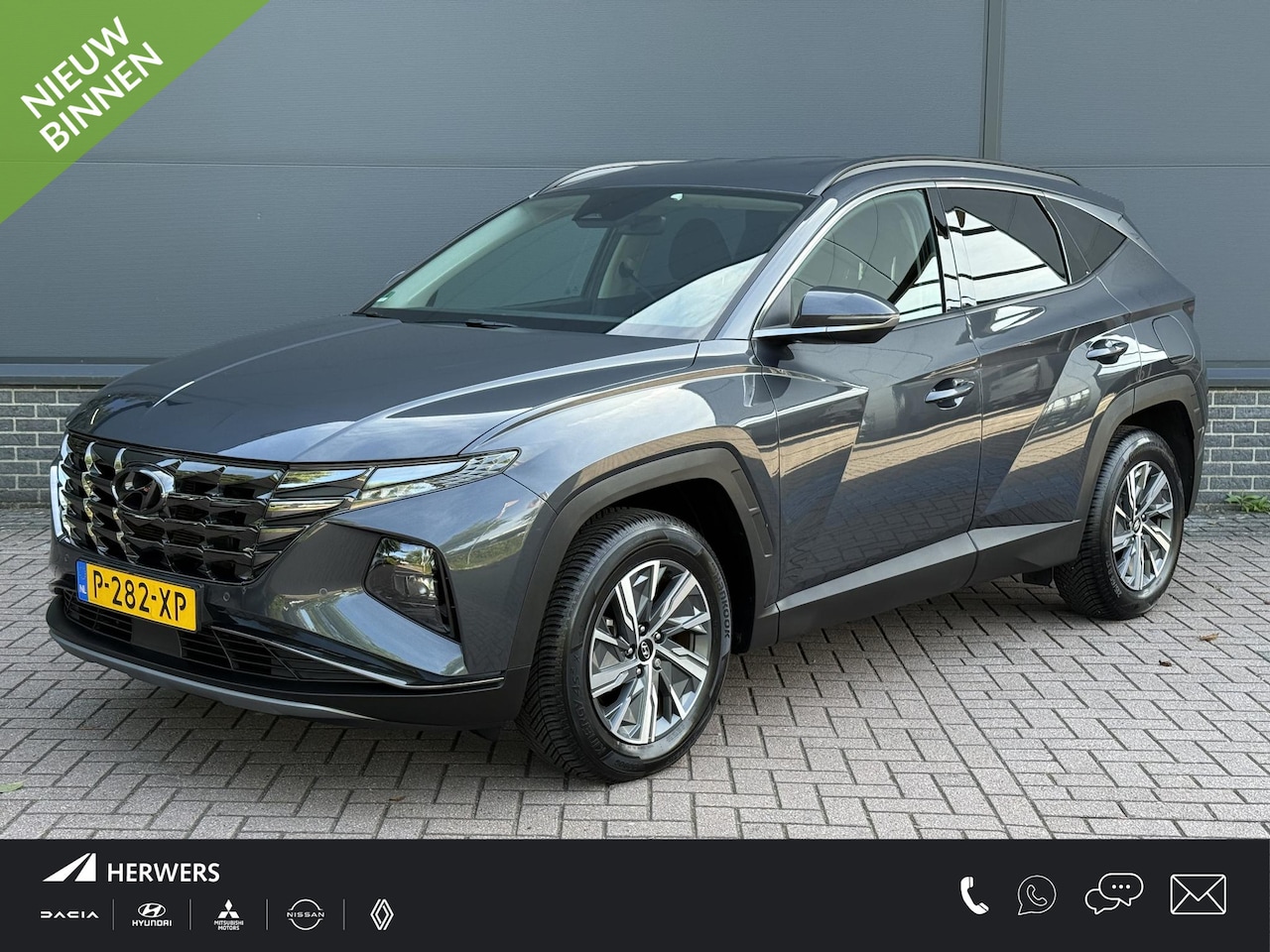 Hyundai Tucson - 1.6 T-GDI HEV Comfort Smart / Eerste Eigenaar / Stoel+Stuur Verwarming / Elektrische Achte - AutoWereld.nl