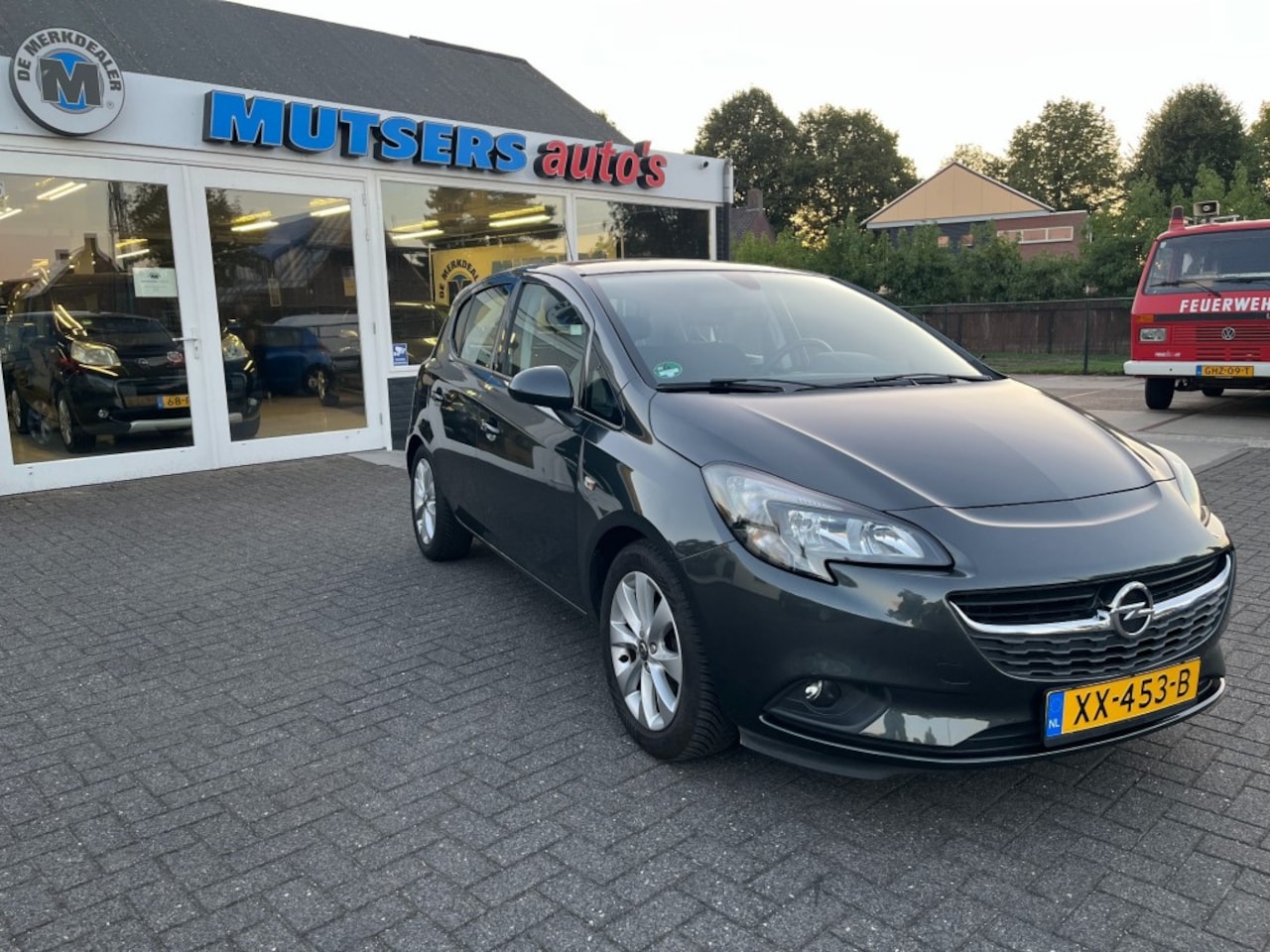 Opel Corsa - 1.4 Favourite 1.4 FAVOURITE, NAVI, CRUISE, uitstekende staat! - AutoWereld.nl