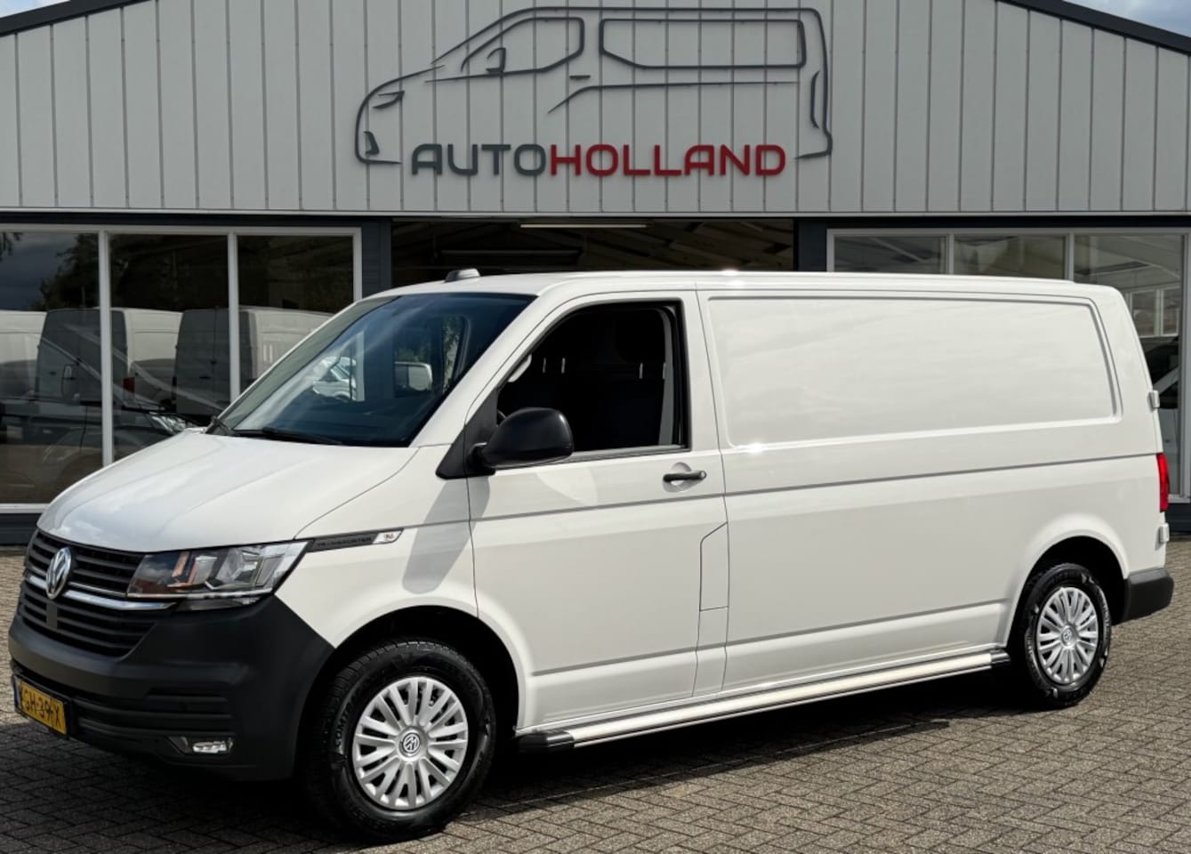 Volkswagen Transporter - 2.0 TDI 81KW 110PK L2H1 EURO 6 AIRCO/ CRUISE CONTROL/ NAVIGATIE/ 100% DEALERONDERHOUDEN - AutoWereld.nl