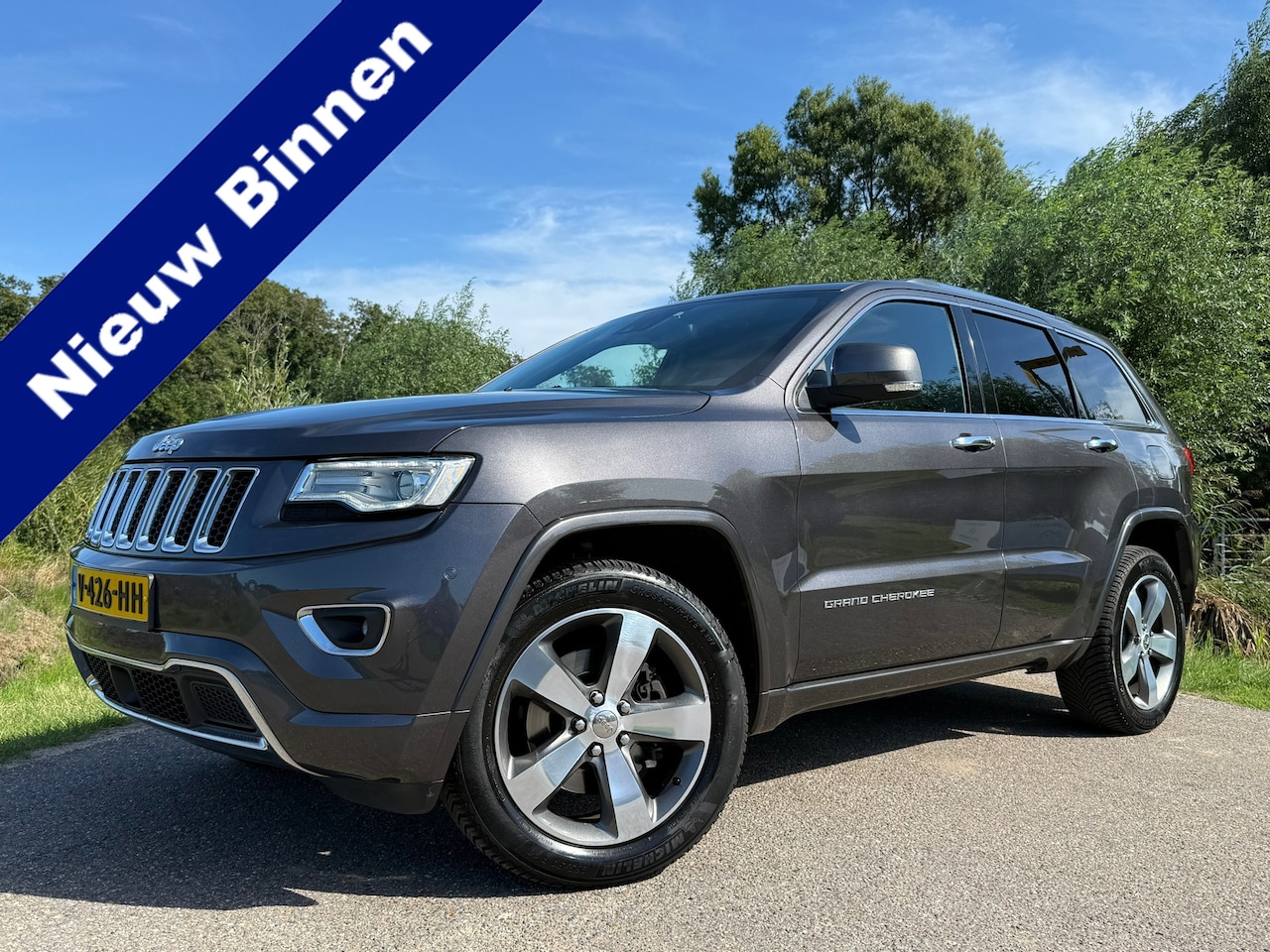 Jeep Grand Cherokee - 3.0 CRD Overland Automaat / Grijs Kenteken / Panoramadak / Leder / Camera / Navi / Clima / - AutoWereld.nl