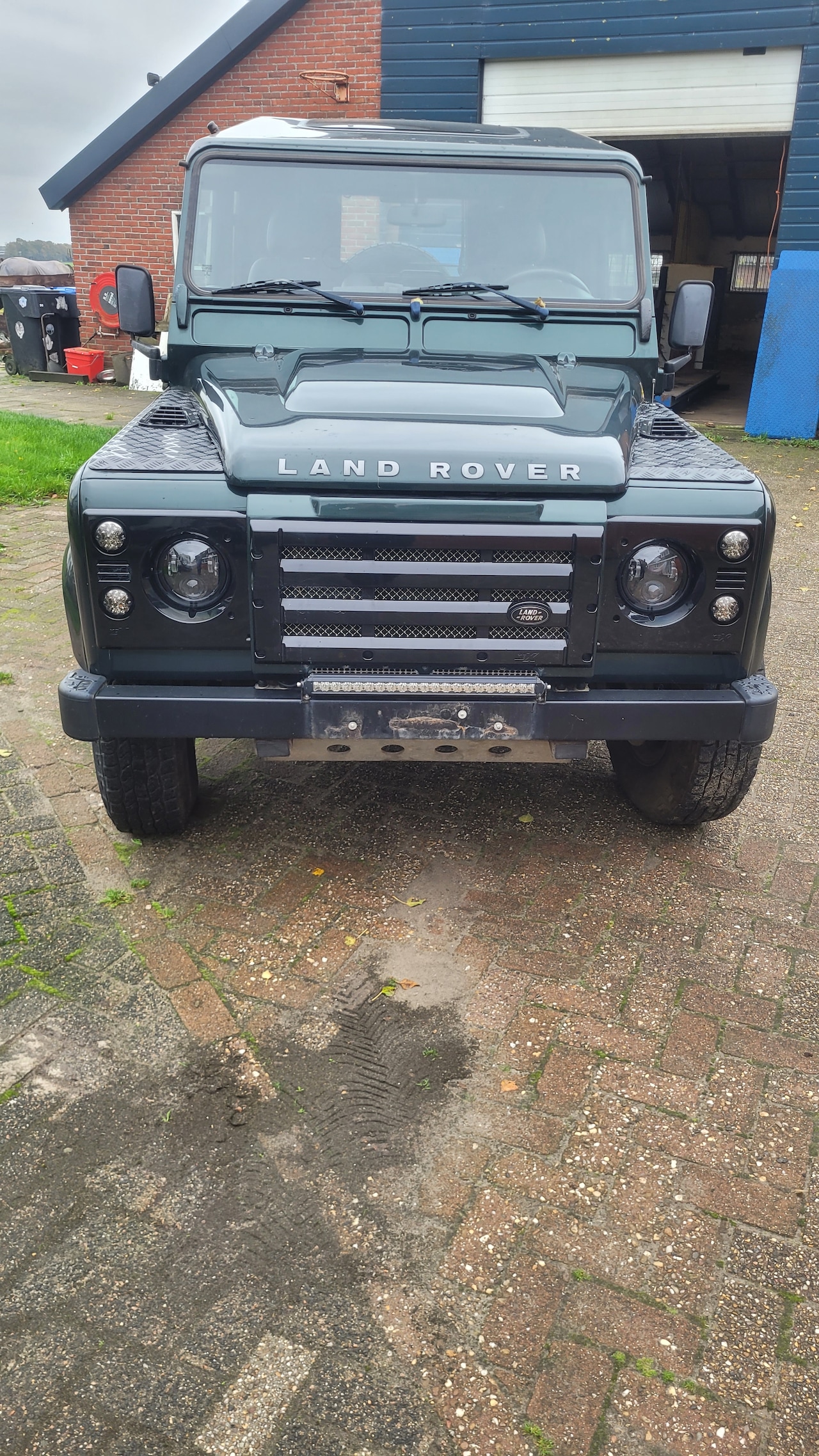 Land Rover Defender - 2.4 TD SW 110" SE cruise control, airco, verwarmd voorraam - AutoWereld.nl