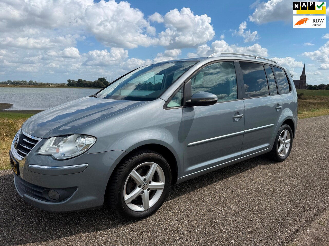 Volkswagen Touran - 1.4 TSI Highline Airco Cruise 7p - AutoWereld.nl