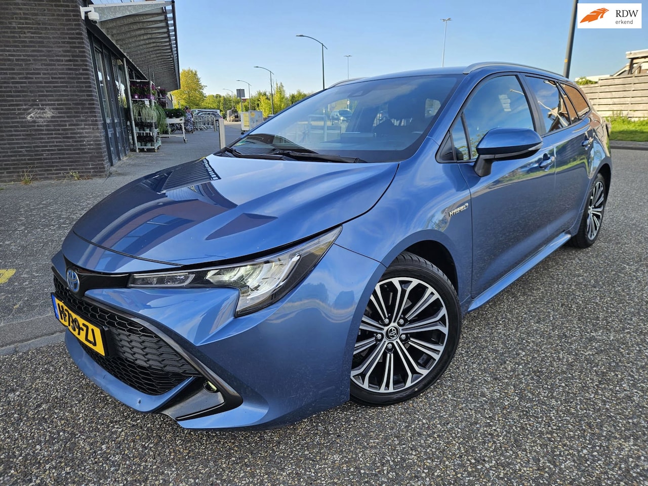 Toyota Corolla Touring Sports - 2.0 Hybrid First Edition 2.0 Hybrid First Edition - AutoWereld.nl