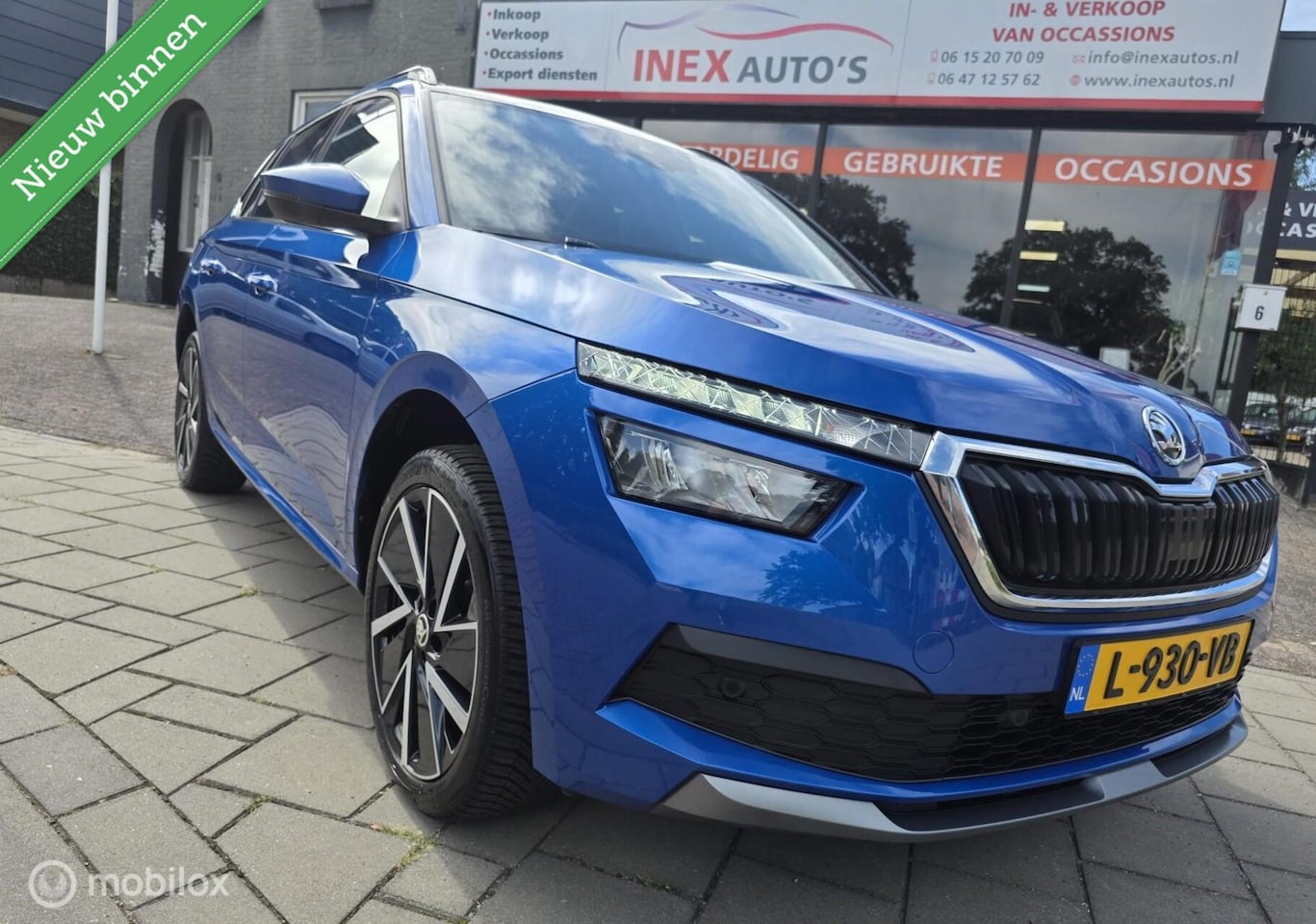 Skoda Kamiq - 1.0 TSI Sport Business/ Panorama dak / Achteruitrij camera / Adaptieve cruise control / - AutoWereld.nl