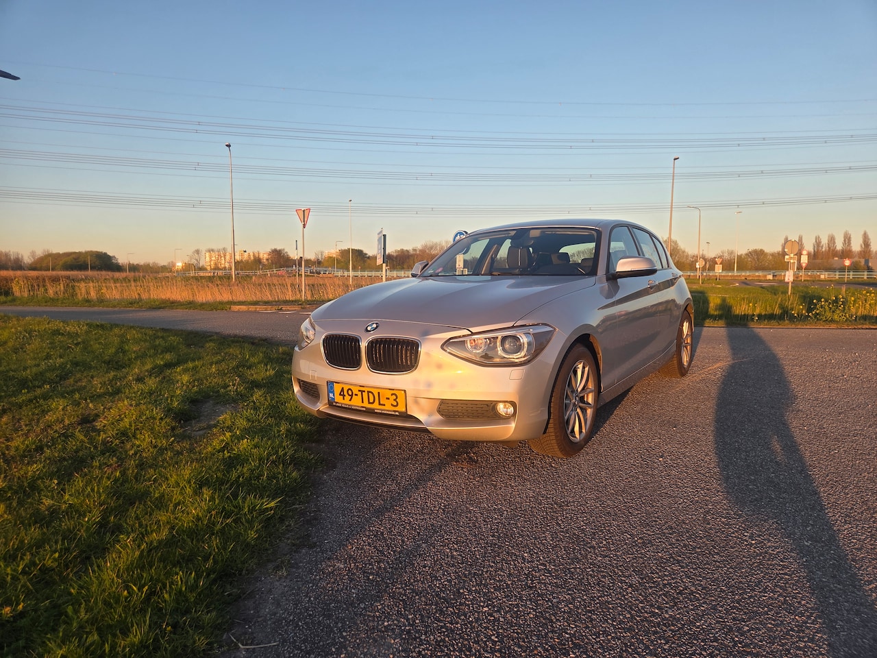 BMW 1-serie - 116i android auto/carplay, climate control, cruise control, lederen interieur - AutoWereld.nl