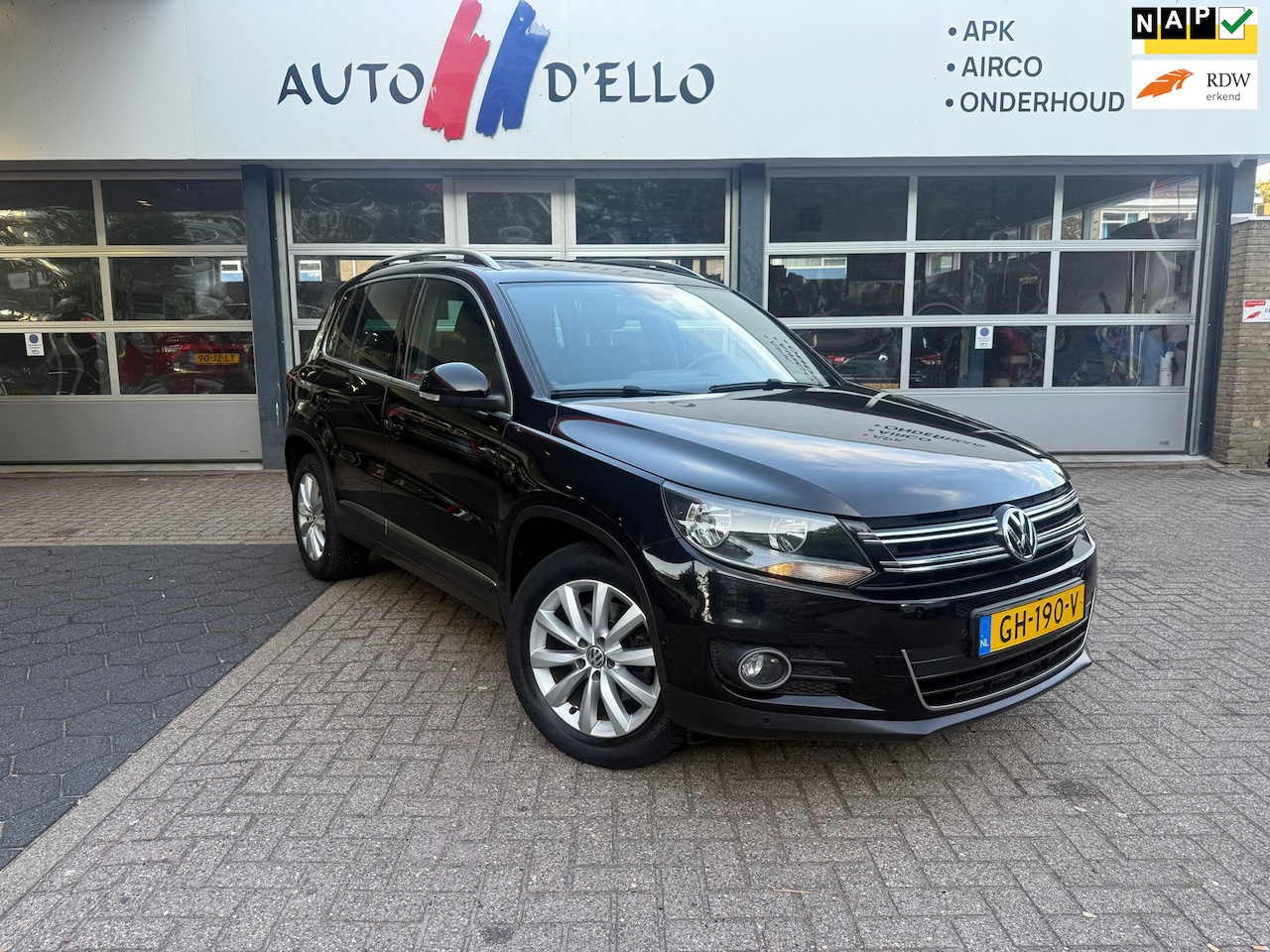 Volkswagen Tiguan - 1.4 TSI Sport&Style CLIMA|PDC|CRUISE|ZWARTHEMEL - AutoWereld.nl