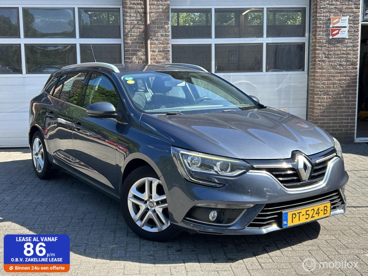 Renault Mégane Estate - 1.5 dCi Eco2 Zen |Clima | Navi | - AutoWereld.nl