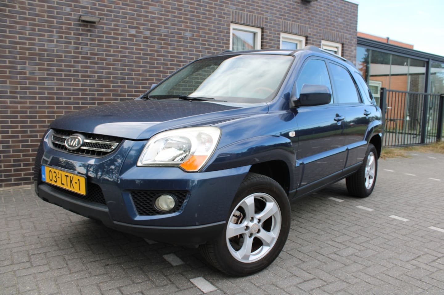 Kia Sportage - 2.0 CVVT Fifteen- climatecontrole,leer,trekhaak - AutoWereld.nl