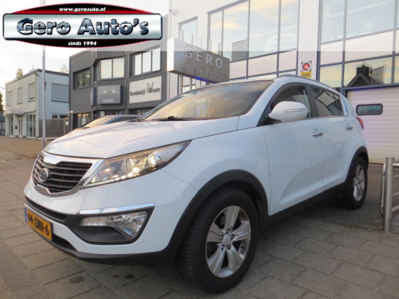 Kia Sportage - 2.0 Plus Pack airco ecc cruise control trekhaak nl-auto ! - AutoWereld.nl