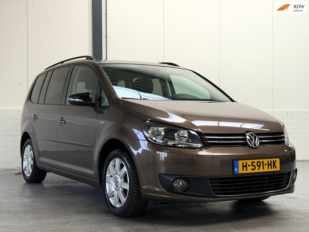 Volkswagen Touran - 1.2 TSI Highline BlueMotion 7p. 1.2 TSI Highline BlueMotion 7p. - AutoWereld.nl