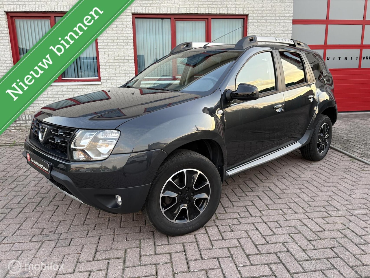 Dacia Duster - 1.2 TCe 4x2 LEER/NAVI/CRUISE/TREKHAAK - AutoWereld.nl