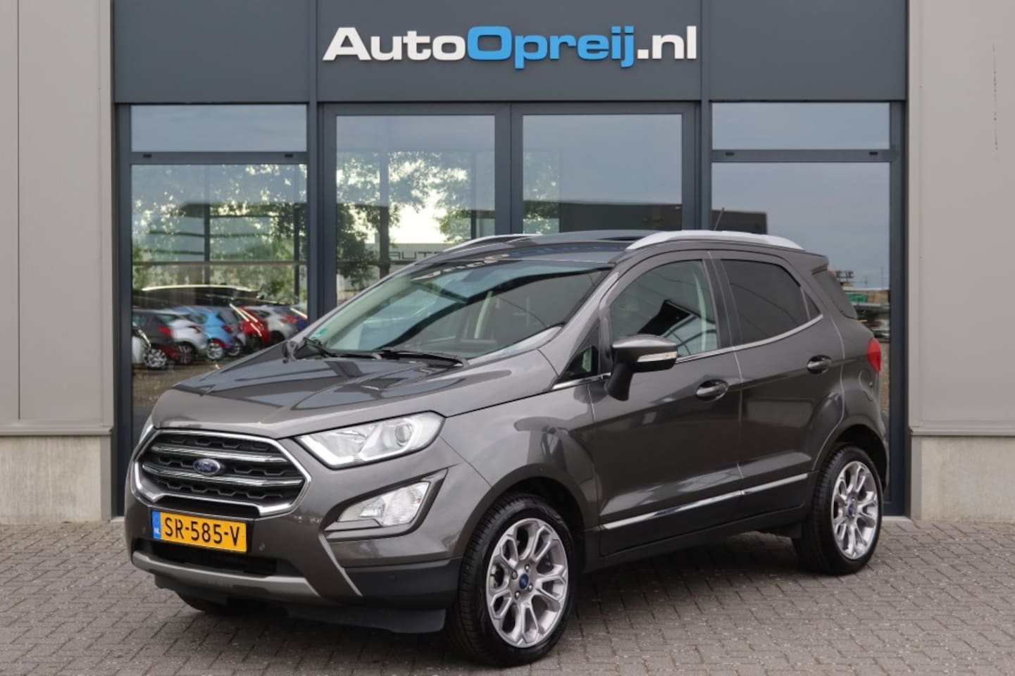 Ford EcoSport - 1.0 Ecoboost Titanium 125pk Clima, NAVI, Camera, schuif/kanteldak, Winter Pack - AutoWereld.nl