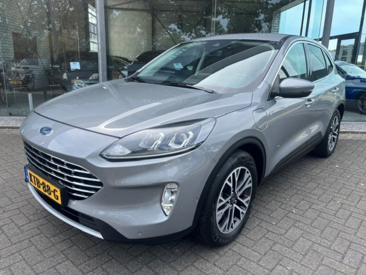 Ford Kuga - 2.5 PLUG-IN HYBRID TITANIUM - AutoWereld.nl