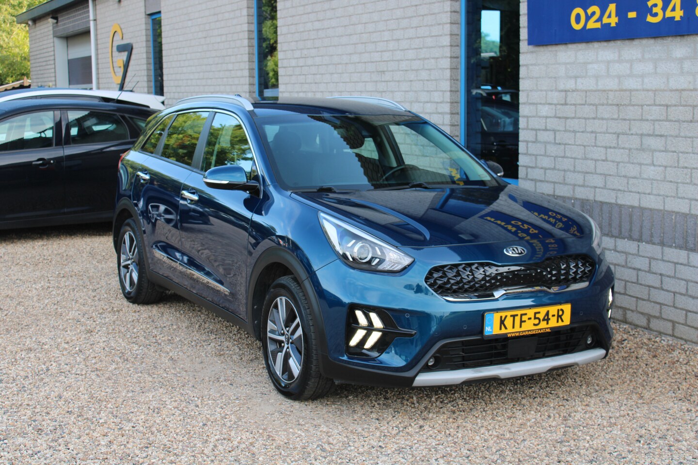 Kia Niro - 1.6 GDi PHEV DynamicLine afn Trekhaak Clima 1/2 leder stoel- en stuurverwarming - AutoWereld.nl