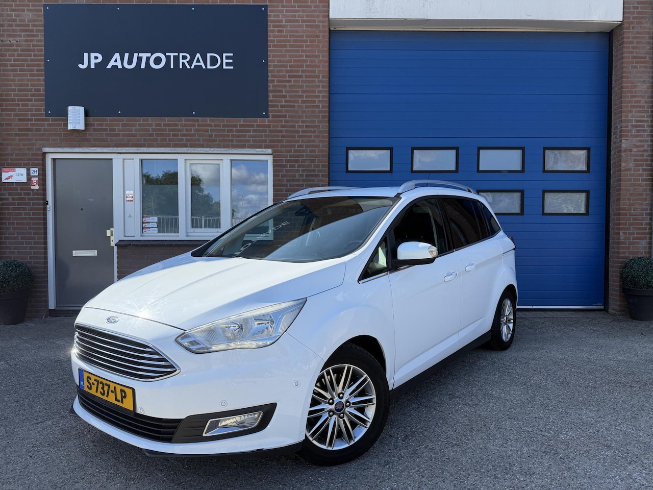 Ford Grand C-Max - 1.0 Titanium 7p. | Cam | Stoelverwarming | PDC | Trekhaak | - AutoWereld.nl