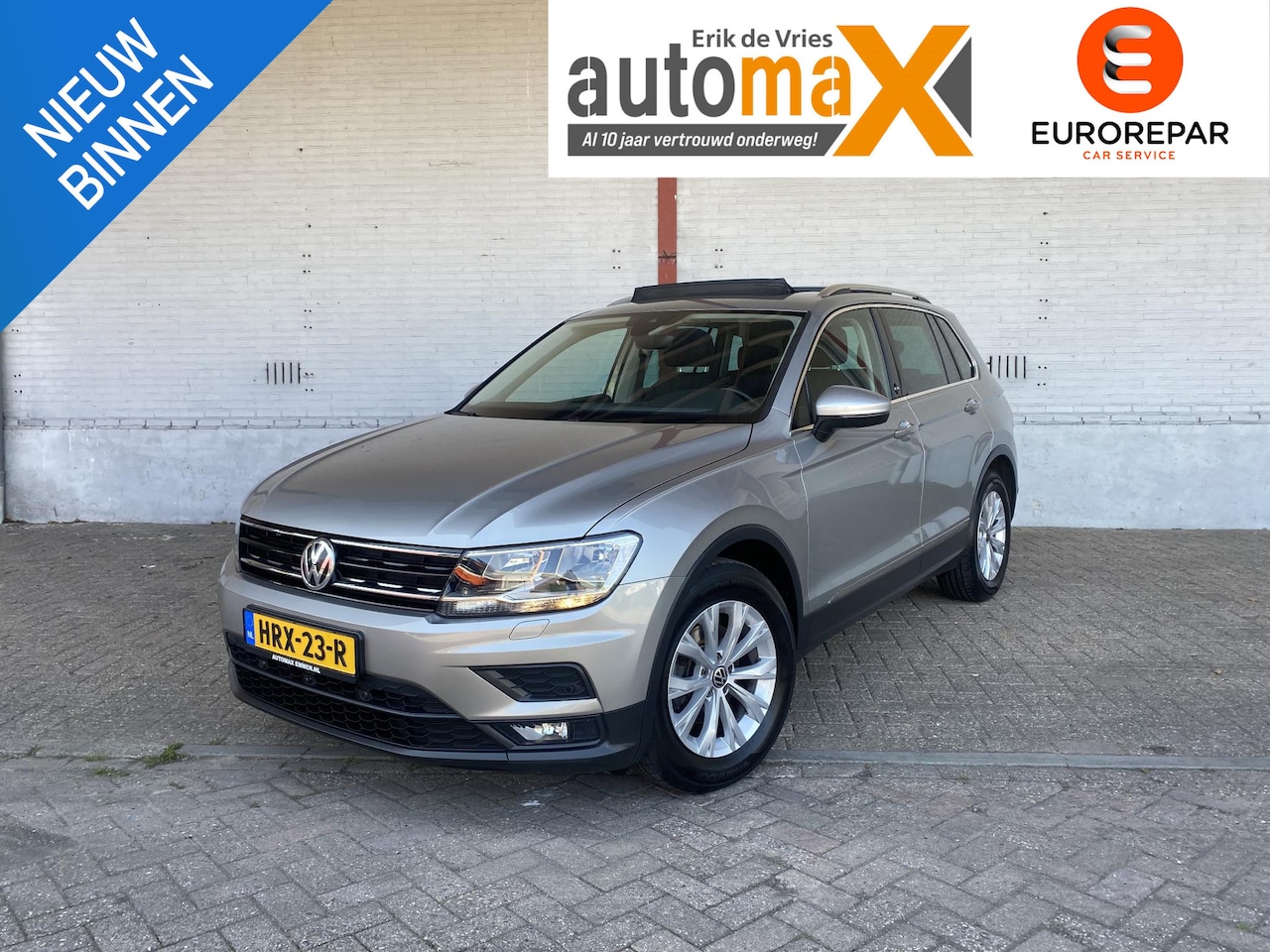 Volkswagen Tiguan - 1.4 TSI Highline |Pano!|Stoel&Stuurwielverwarming!| - AutoWereld.nl
