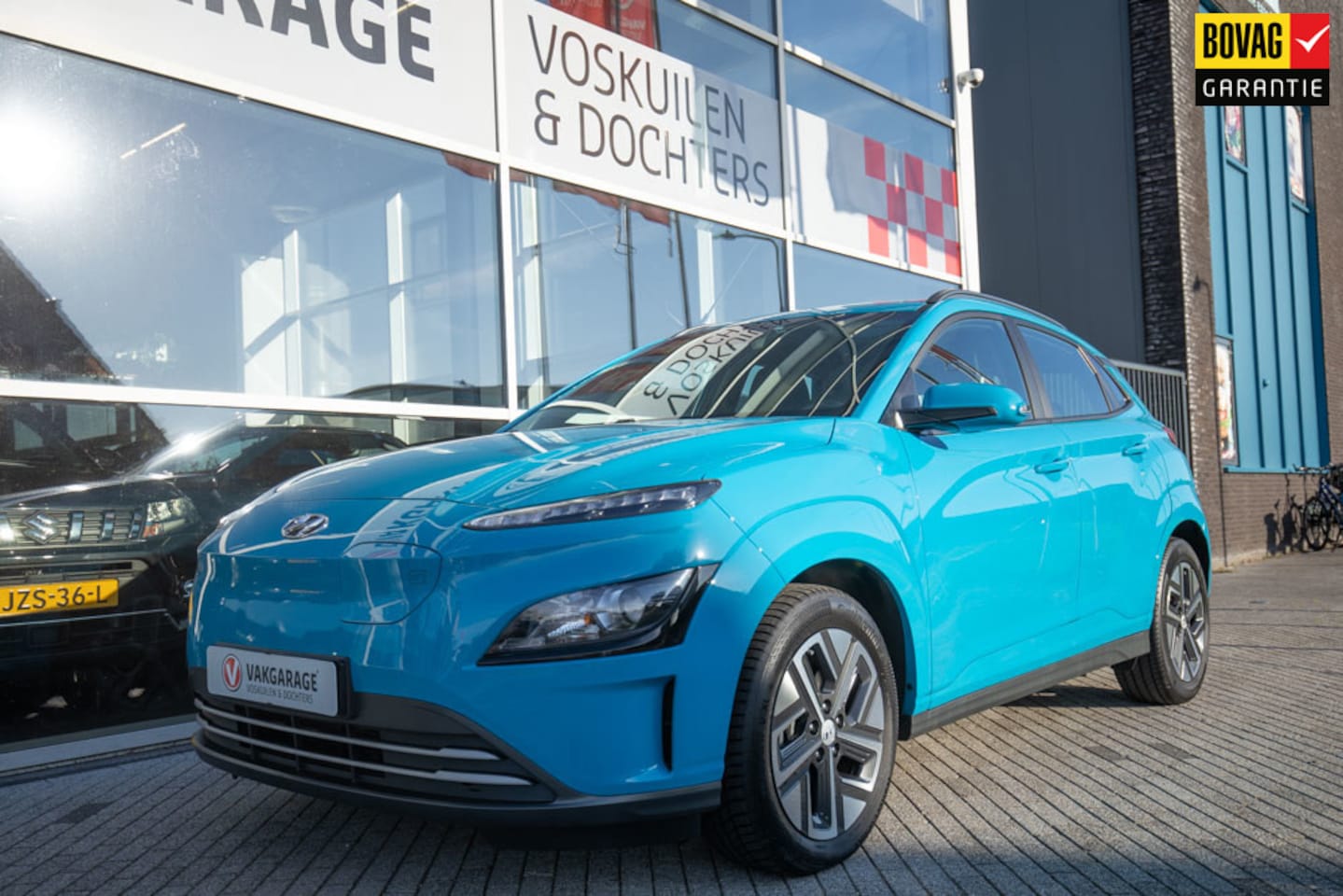 Hyundai Kona Electric - EV Pure 64 kWh SOH 100% - AutoWereld.nl