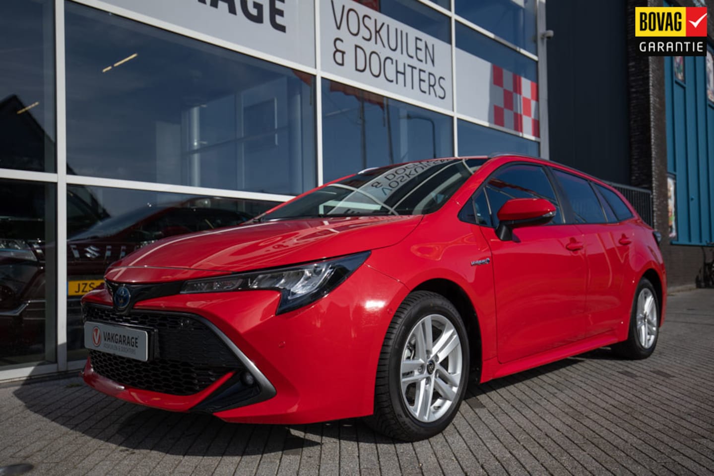 Toyota Corolla Touring Sports - 1.8 Hybrid Business Plus Tech | Dodehoek | Parkassist - AutoWereld.nl