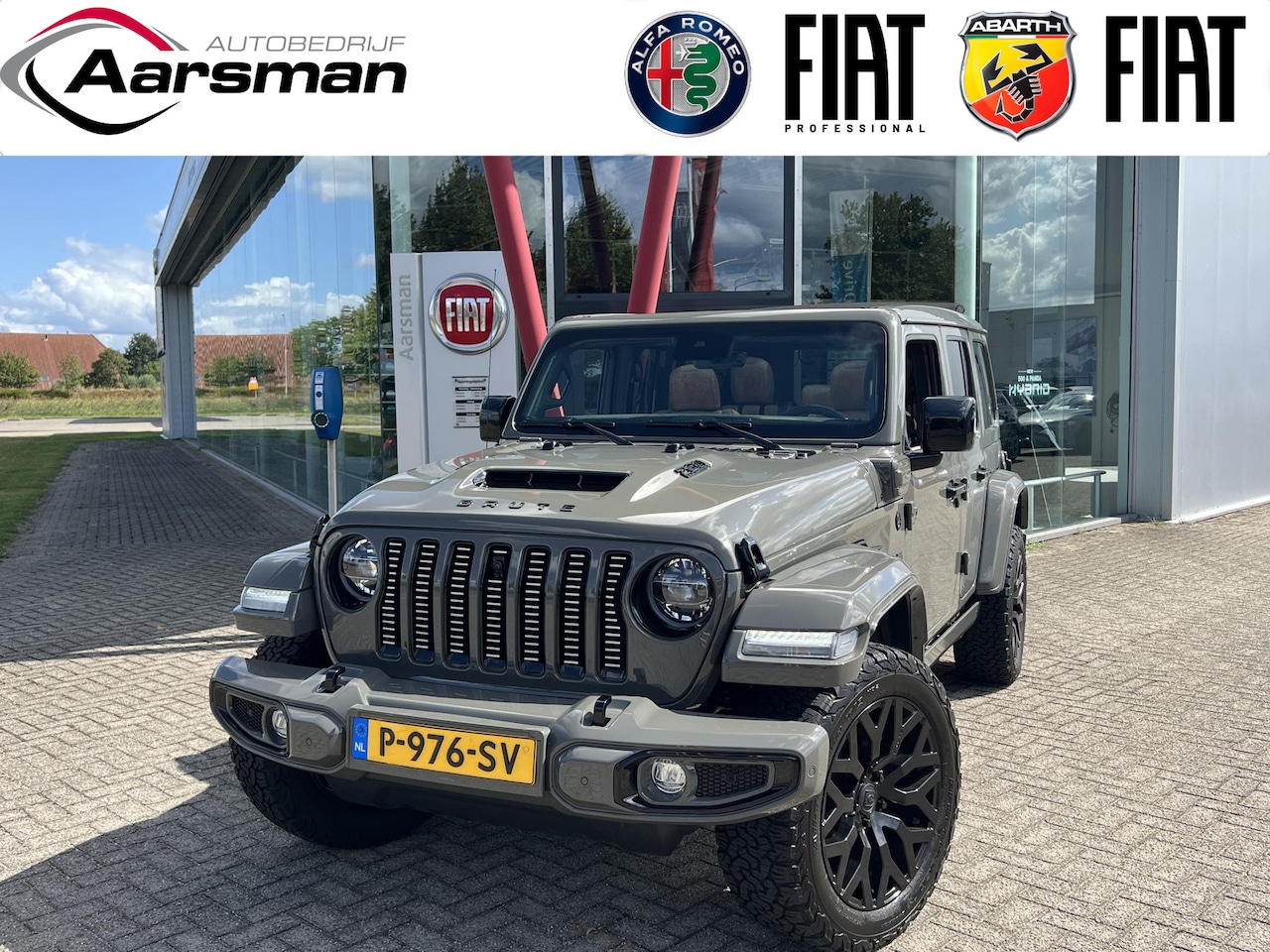 Brute Richmond - Unlimited Custom 4xe 380 Sahara | BTW | Vouwdak | Bruin leder | Camera's | Sarge Green | J - AutoWereld.nl