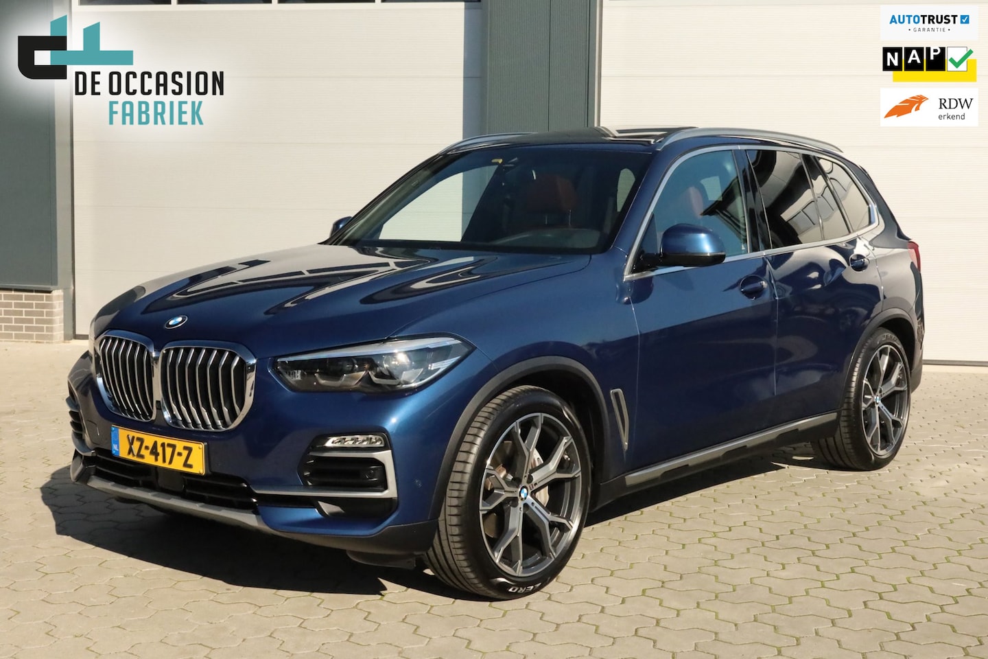 BMW X5 - XDrive40i High Executive Luchtvering 4-wielsturing Pano Trekhaak Carplay Harman Kardon - AutoWereld.nl