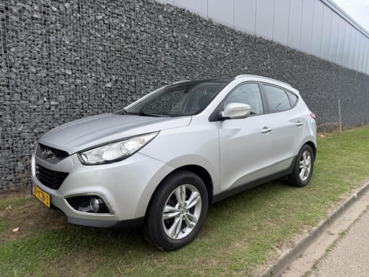 Hyundai ix35 - 2.0i Active Airco | Navi | Camera - AutoWereld.nl