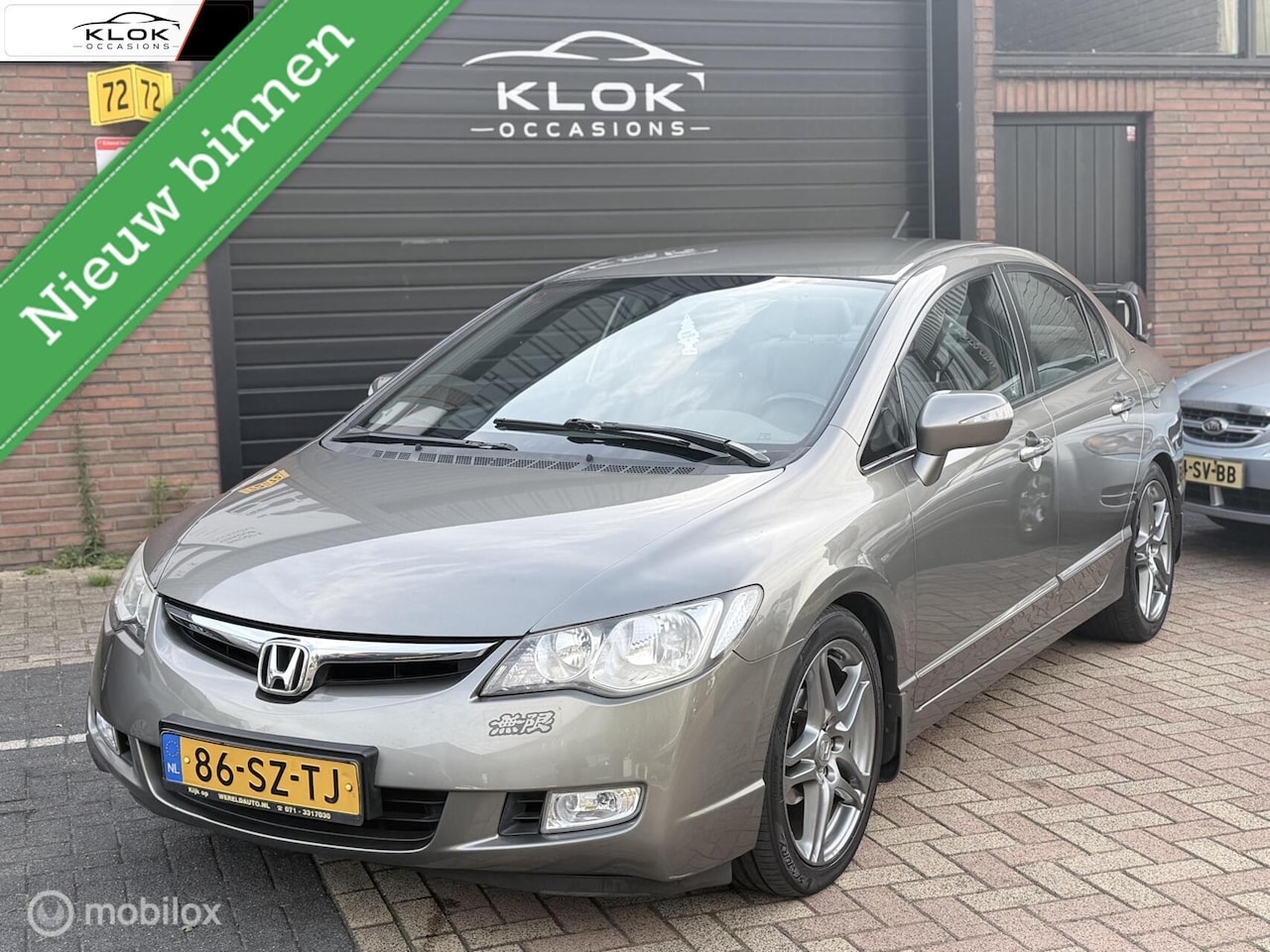 Honda Civic - 1.3 Hybrid Sport NAP Airco Cruise Stoelverwarm - AutoWereld.nl