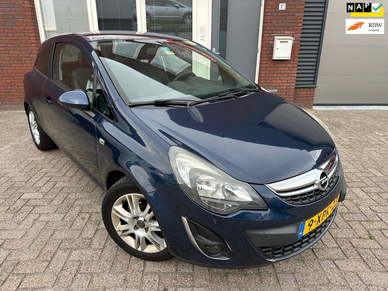 Opel Corsa - 1.2-16V BlitZ / Navi / PDC / Cruise / Stoelverw / NAP / Airco / Stuurverw / LM - AutoWereld.nl