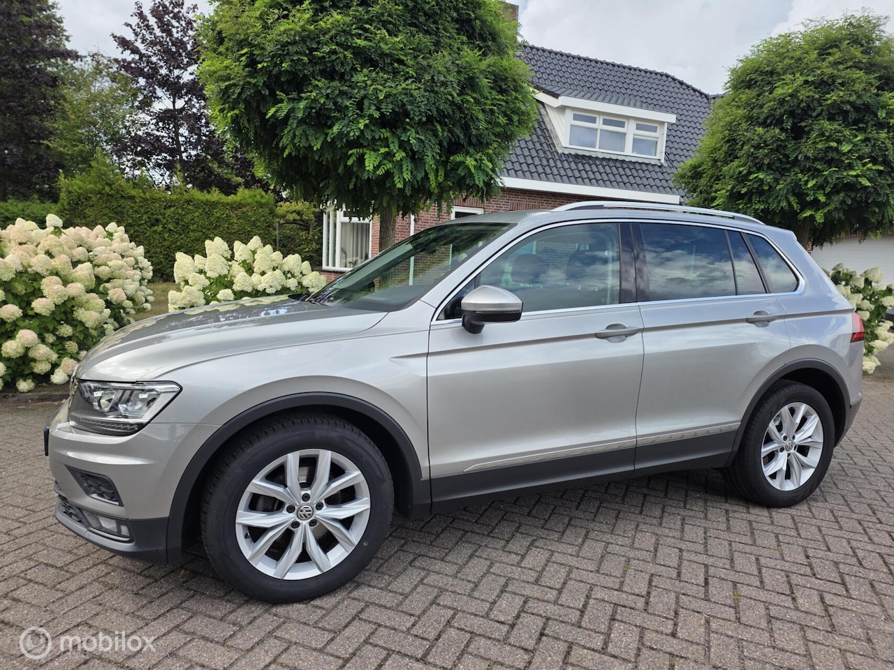 Volkswagen Tiguan - 1.4 TSI Highline/pano dak/carplay/nav - AutoWereld.nl