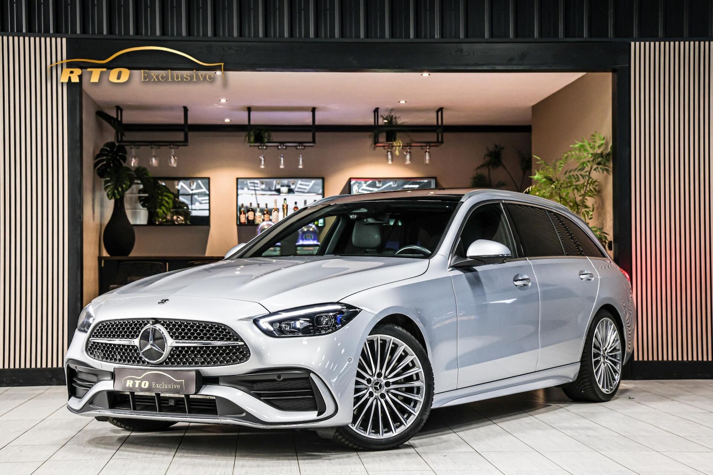 Mercedes-Benz C-klasse Estate - 200 AMG|Pano|Trekh|Memory|Laser|HUD - AutoWereld.nl