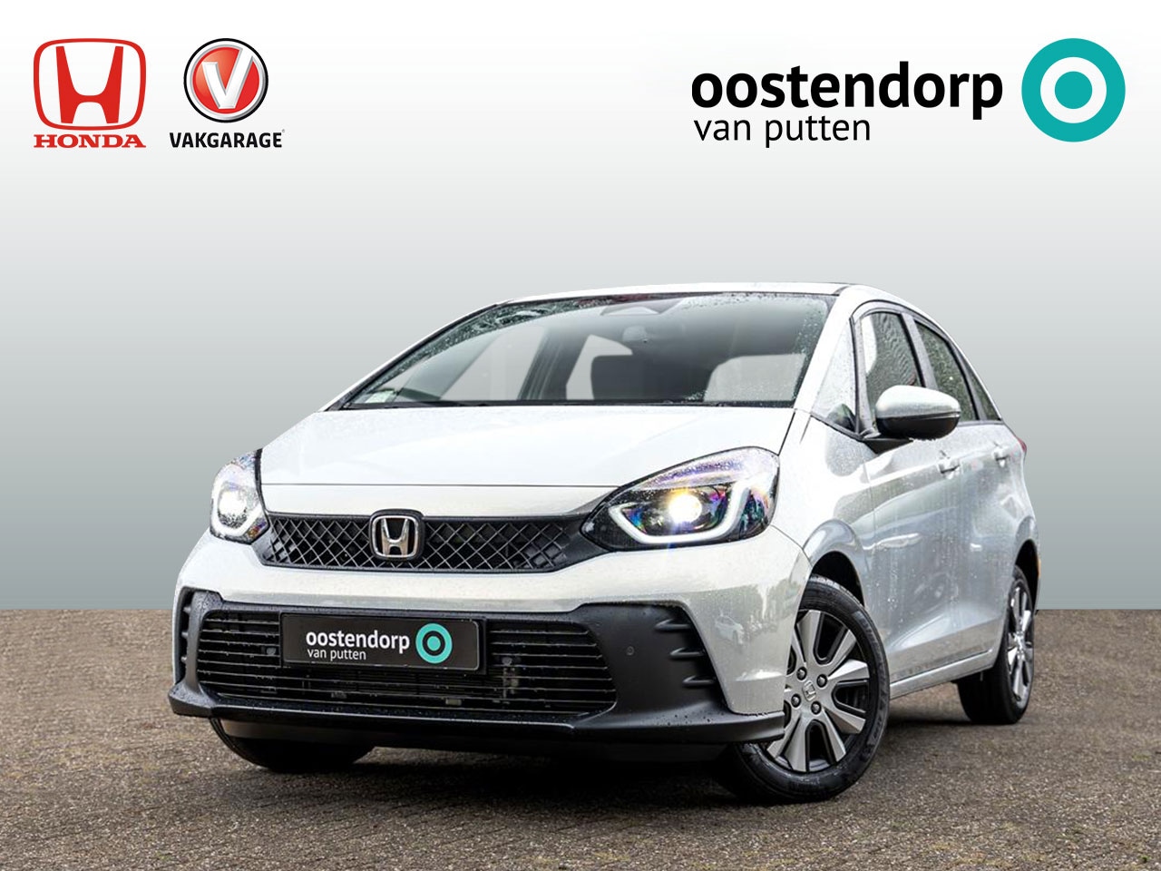 Honda Jazz - 1.5 Full Hybrid Elegance Automaat | 8 jaar garantie | Premium Sunlight Silver Metallic | S - AutoWereld.nl