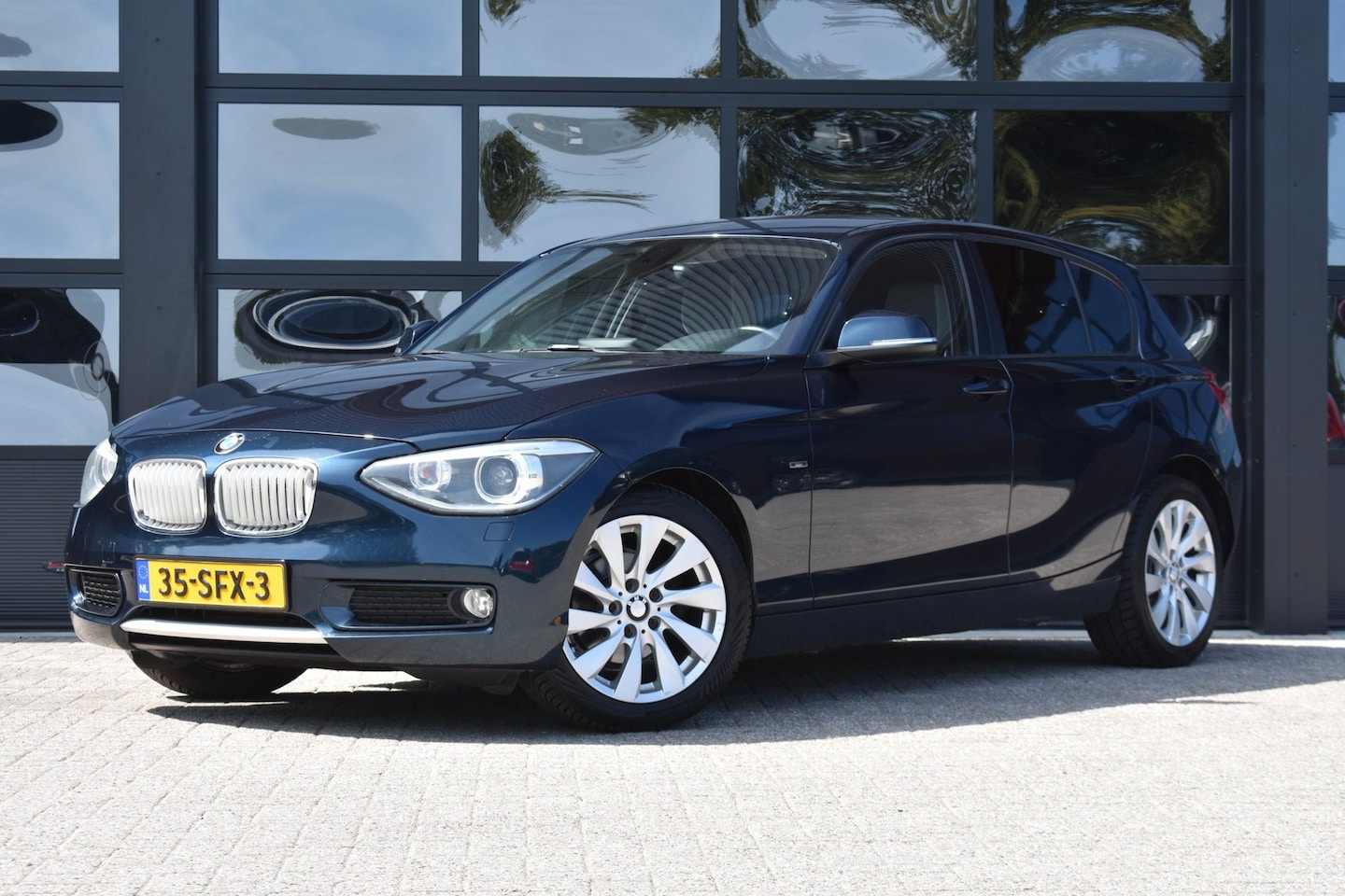 BMW 1-serie - 116i Business '11 Navi Clima Cruise - AutoWereld.nl