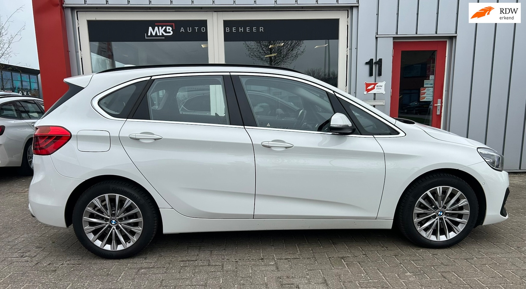 BMW 2-serie Active Tourer - 220i High Executive Trekhaak/LED - AutoWereld.nl