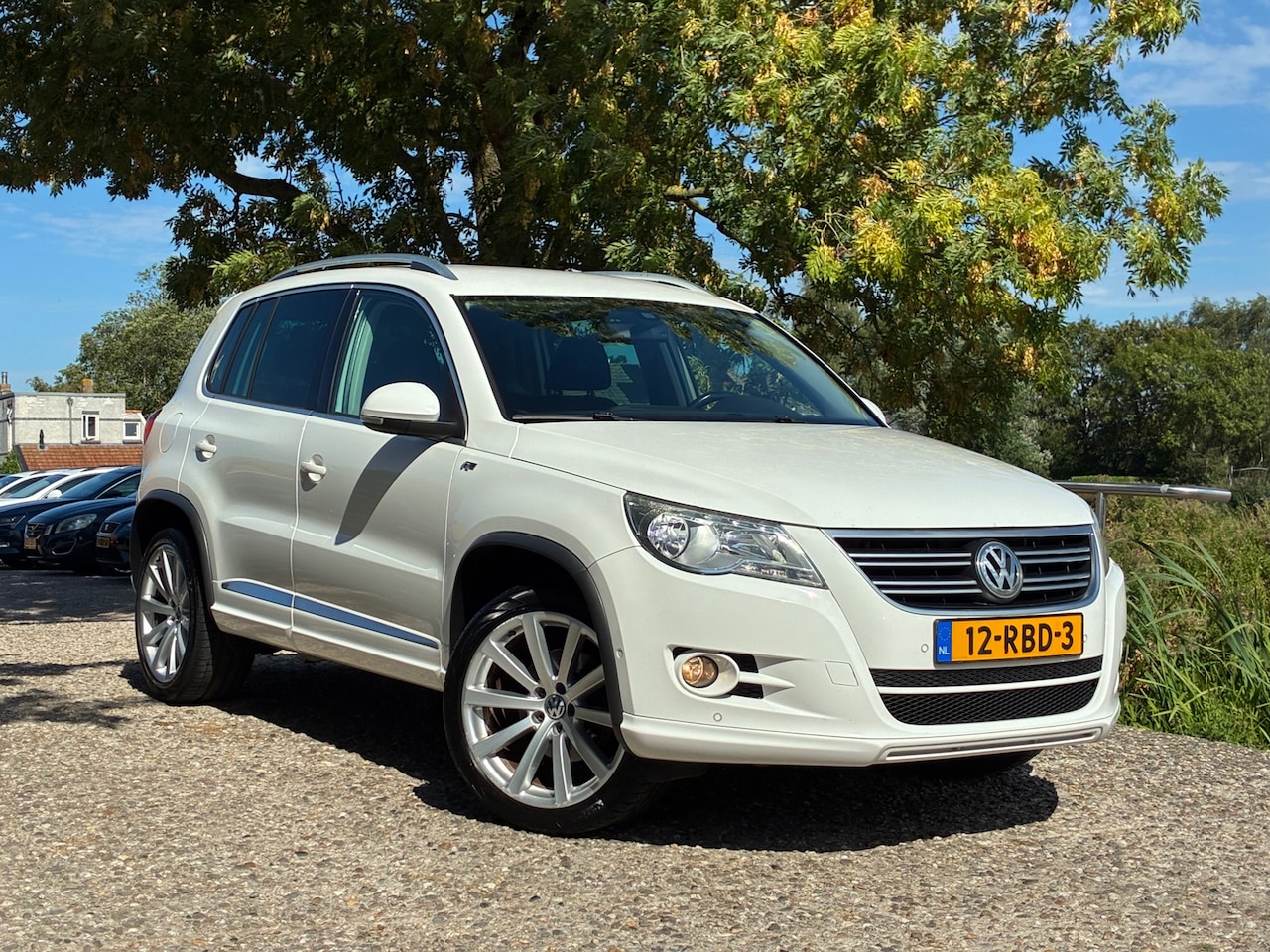 Volkswagen Tiguan - 1.4 TSI R-Line | Nette auto!! | Navi + Clima + Cruise nu €7.450,-!! - AutoWereld.nl