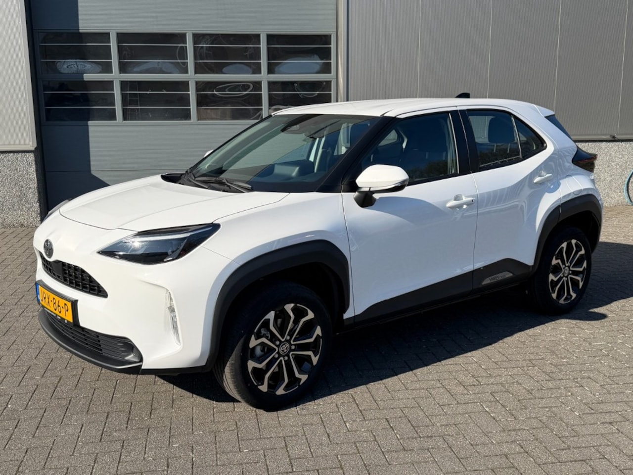 Toyota Yaris Cross - 1.5 HYBRIDE 115pk  Stoelverw.  10 jaar garantie - AutoWereld.nl