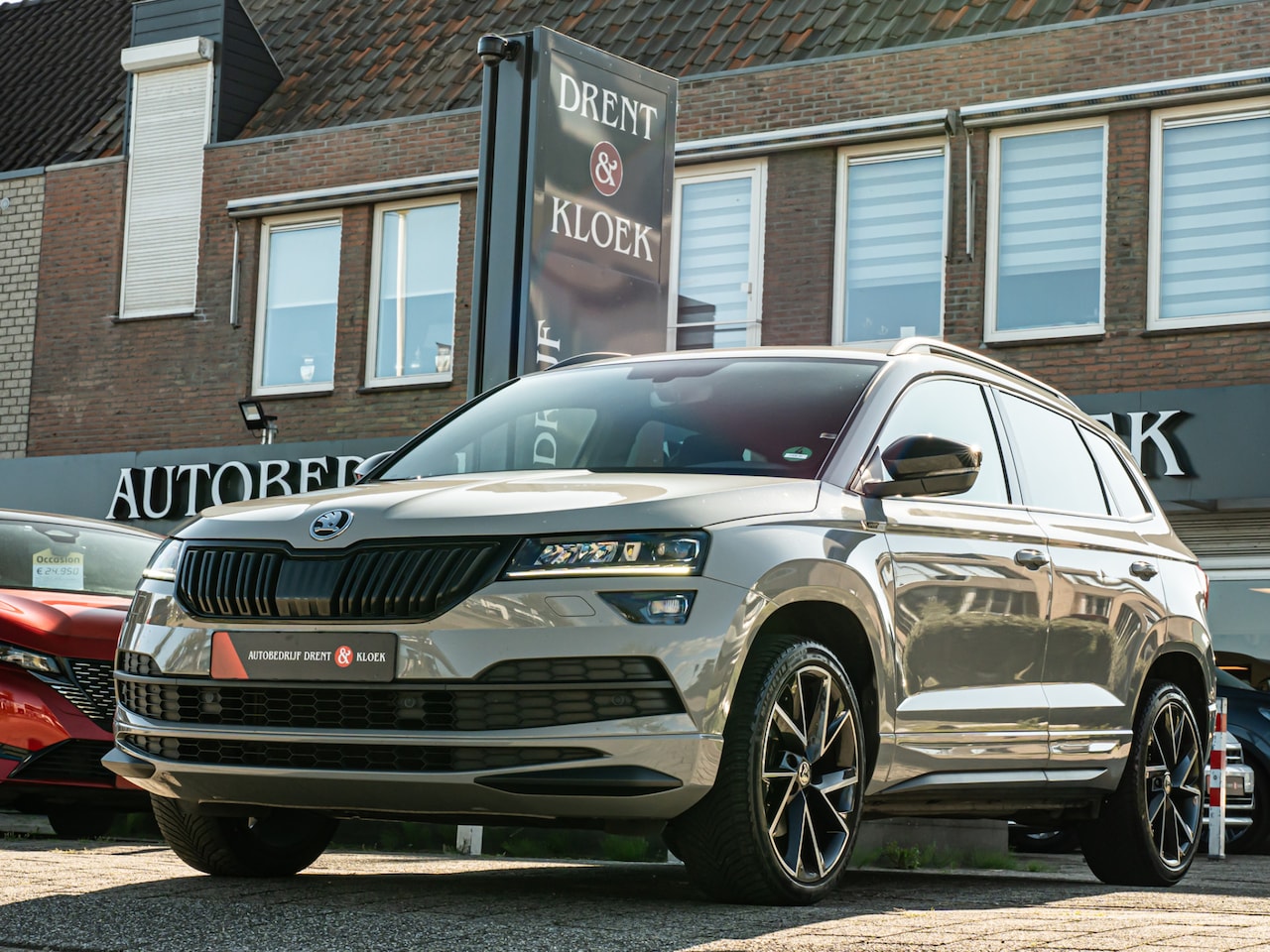 Skoda Karoq - 1.5 TSI ACT Sportline Business ORG NL 19 INCH CAMERA CANTON AUDIO STOELVERW SPORTSTOELEN - AutoWereld.nl